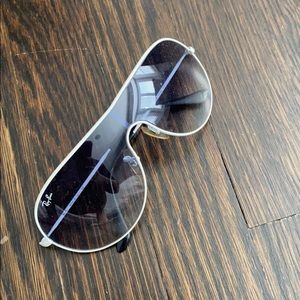 White rim rounded RayBans